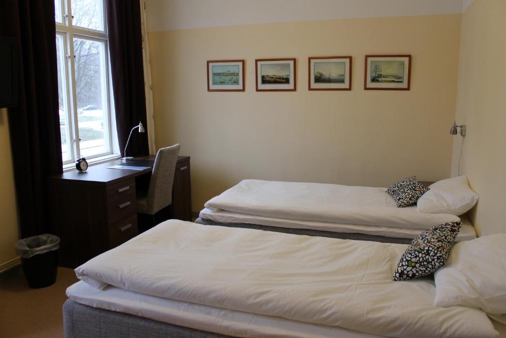 Stationshusets Hotell Och Cafe Köping Quarto foto