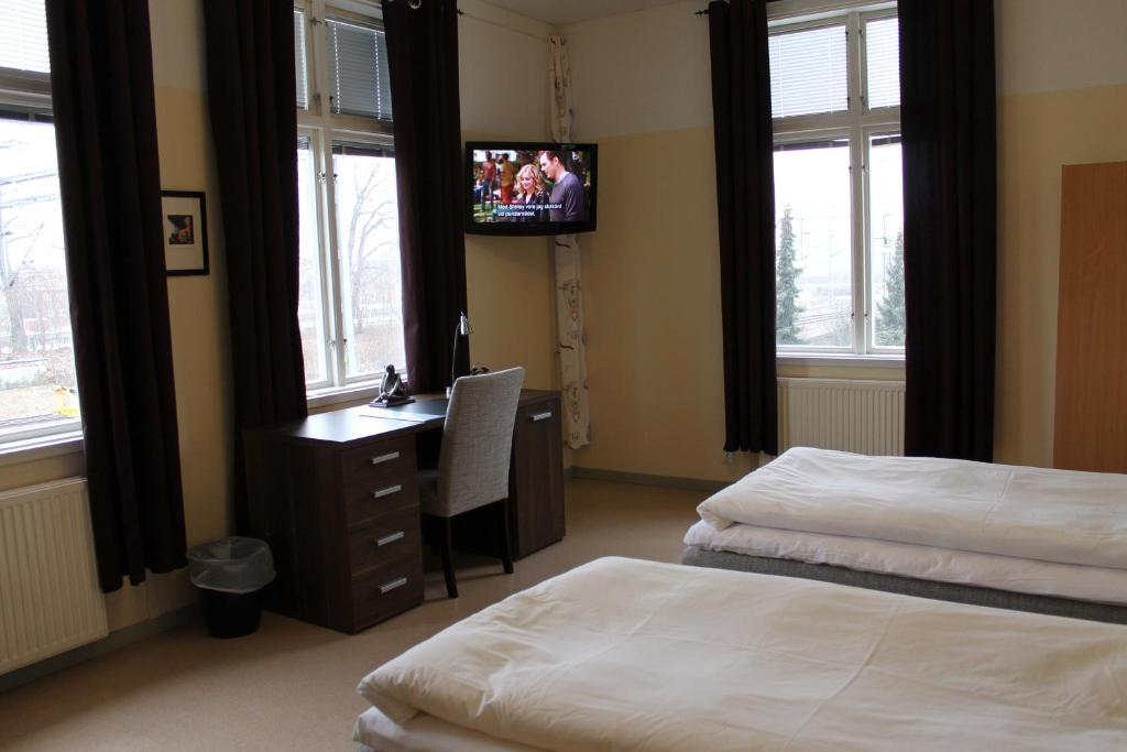 Stationshusets Hotell Och Cafe Köping Quarto foto